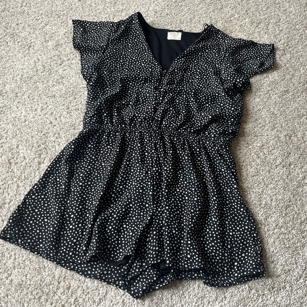 Sienna Sky black and white polka dot short sleeve romper